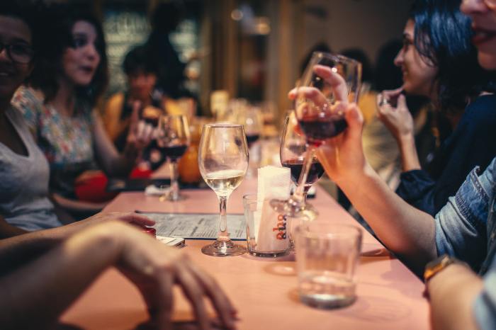 People drinking while dining