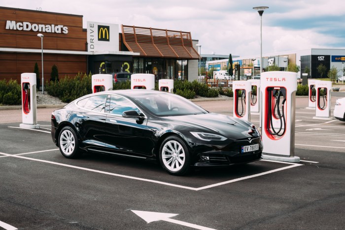 Tesla EV charging outside McDonald's.