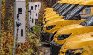 Line of EV vans charging