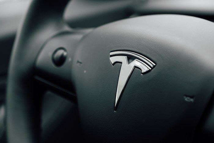 A black Tesla steering wheel