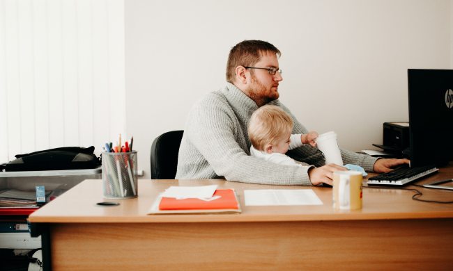 home office baby friendly man working child