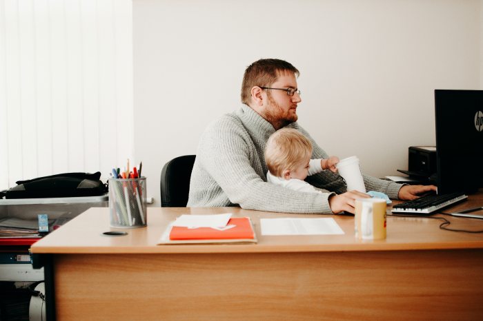 home office baby friendly man working child