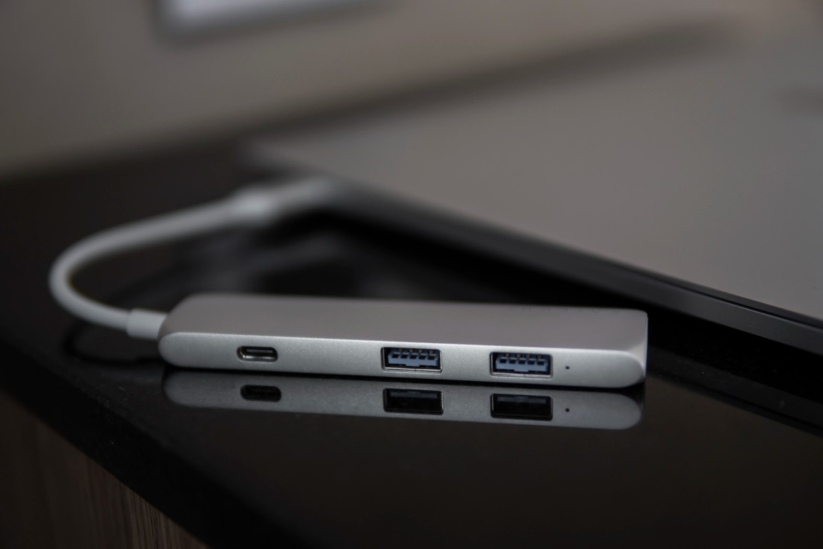 The USB adapter under the Type-C connector for laptop. Multiport station for macbook with multiple different ports